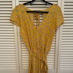 A floral yellow tie short romper